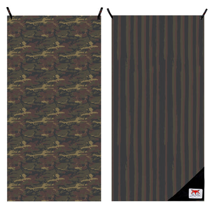 Two rectangular panels showing Camo print towel side by side on a white background. The left panel has an allover camouflage pattern in dark brown, olive green, black, and tan, with black hanging tabs at the top.
