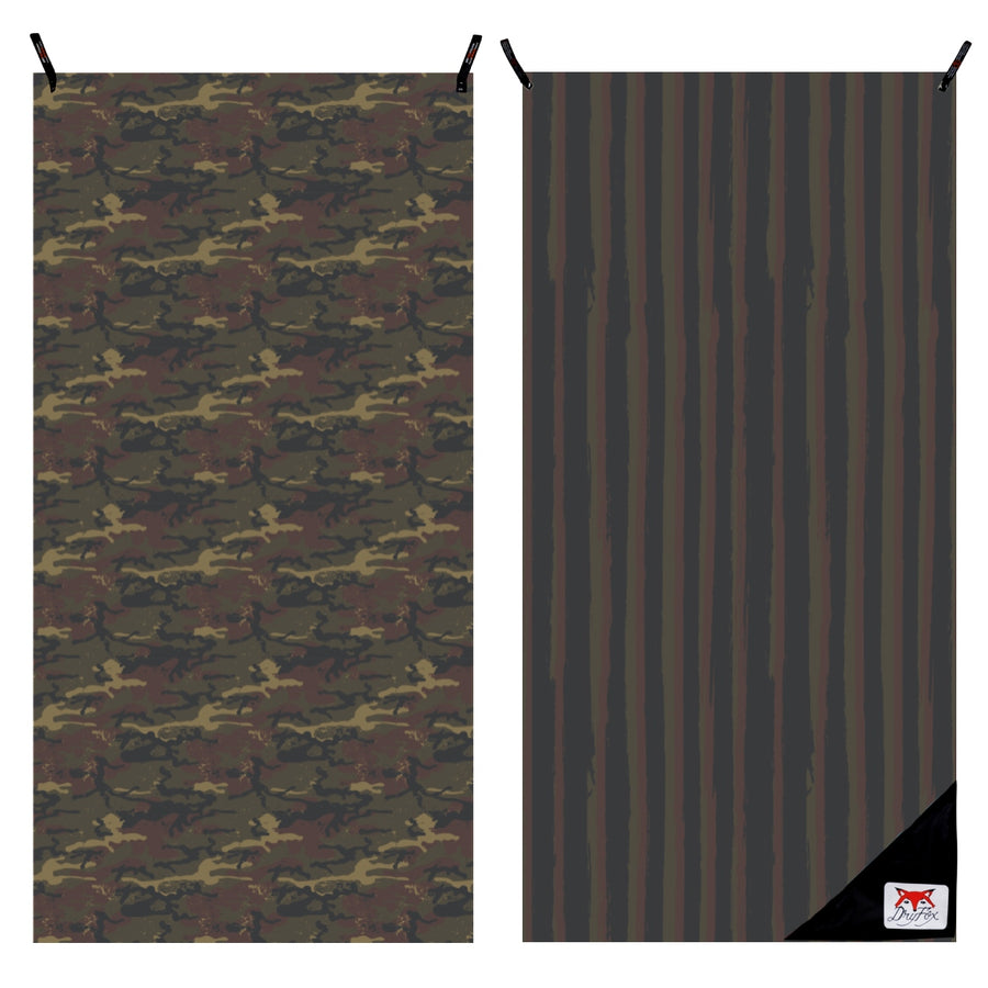 Two rectangular panels showing Camo print towel side by side on a white background. The left panel has an allover camouflage pattern in dark brown, olive green, black, and tan, with black hanging tabs at the top.