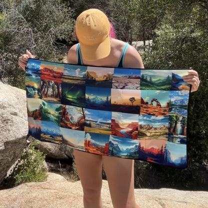 A person outdoors holding up a DryFox Pack towel in Explore print with a grid of colorful landscape photos, including red rock canyons, mountains, lakes, and desert scenes.