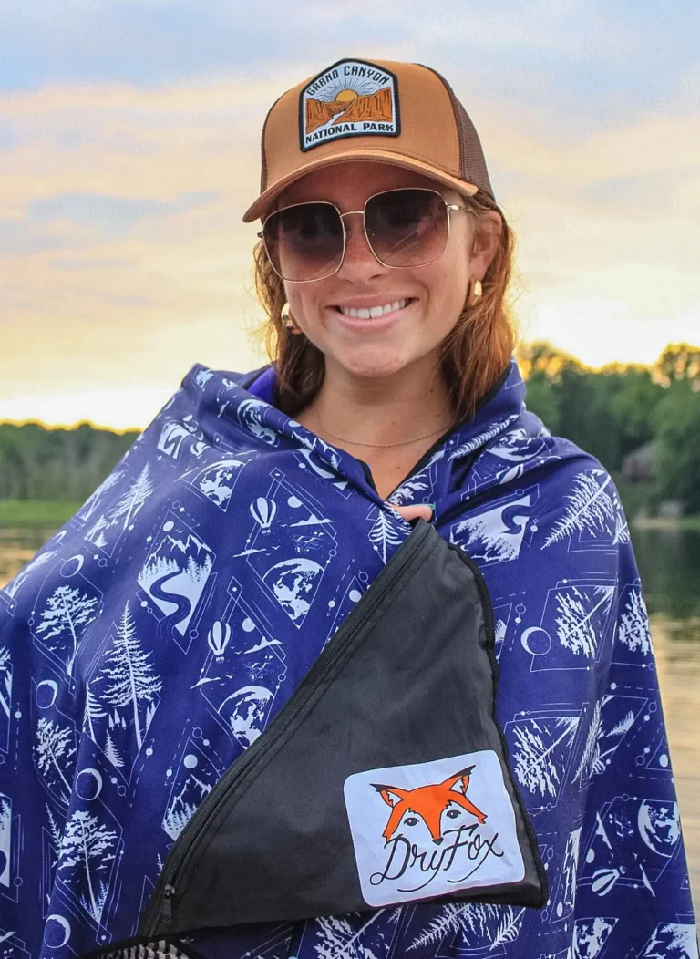 girl with dryfoxco towel at lake