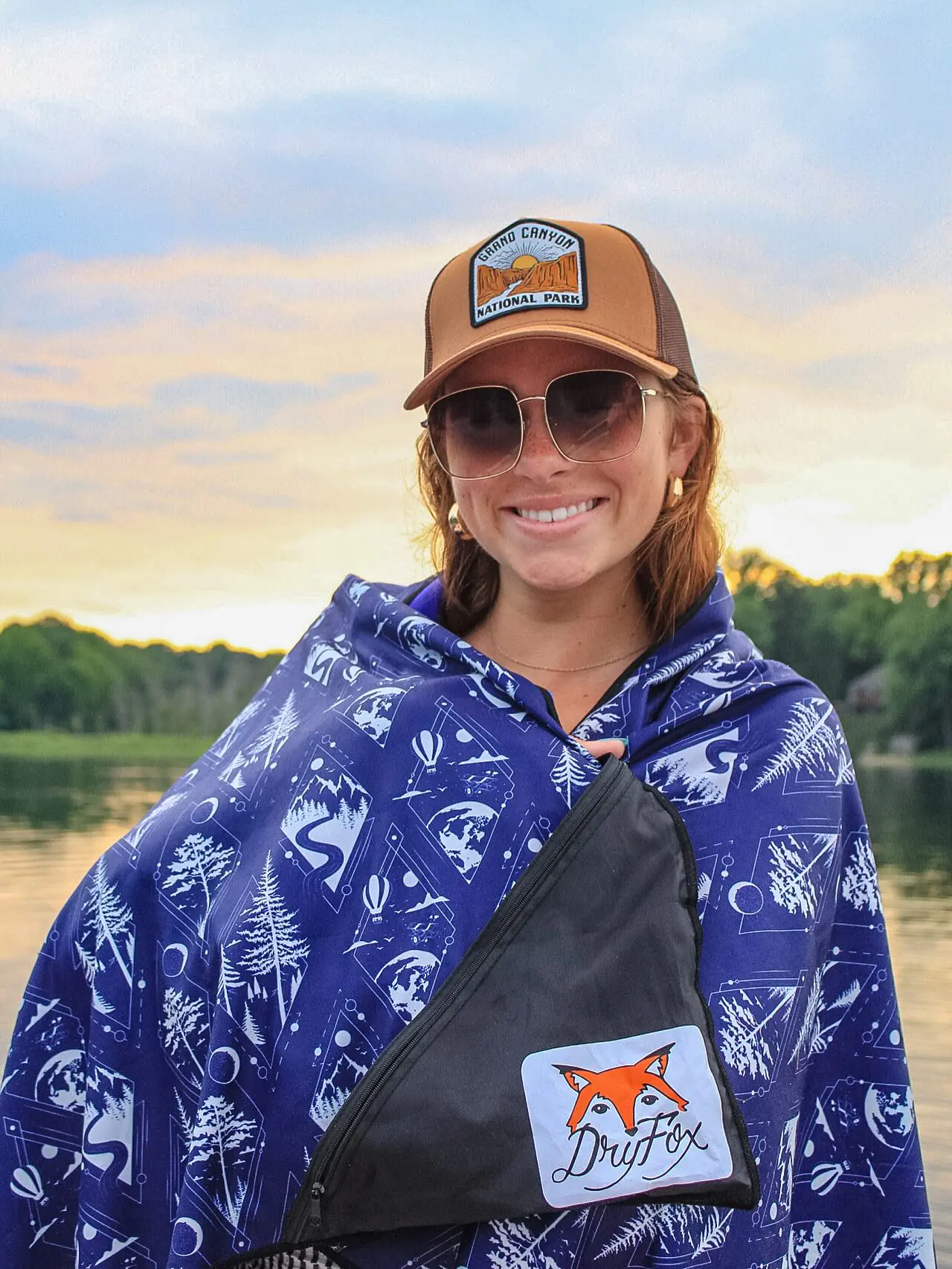 girl with dryfoxco towel at lake